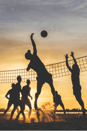 Students actively participating in a volley ball tournaments